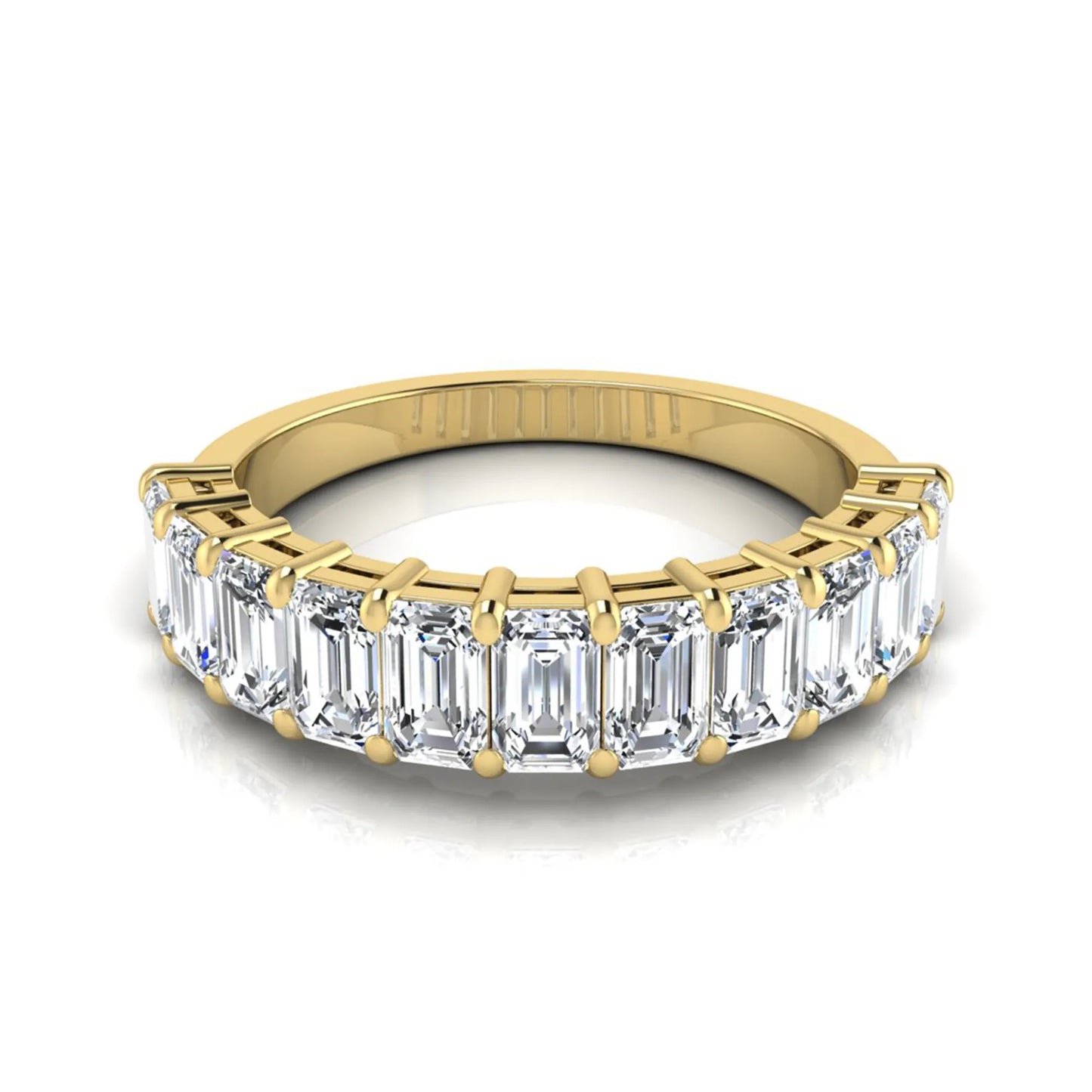 Emerald cut lab grown diamond half eternity band featuring shared prong set diamonds in a yellow gold tone finish.