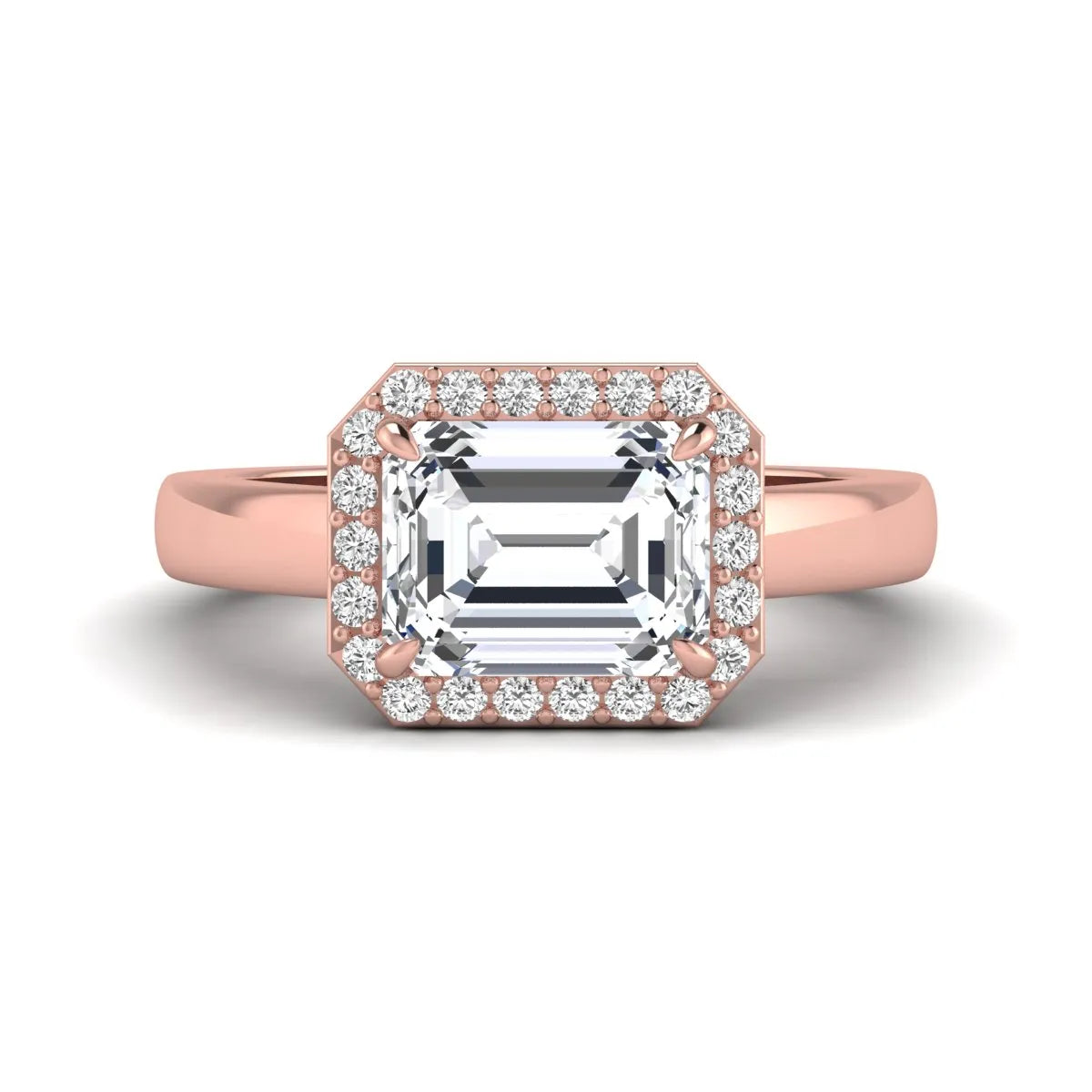 IGI certified emerald cut lab grown diamond halo engagement ring with round diamond halo in rose gold.