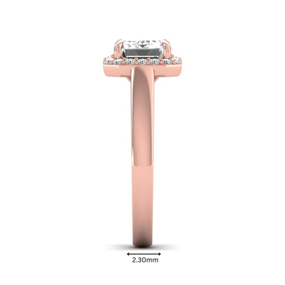 IGI certified emerald cut lab grown diamond halo engagement ring with round diamond halo in rose gold.