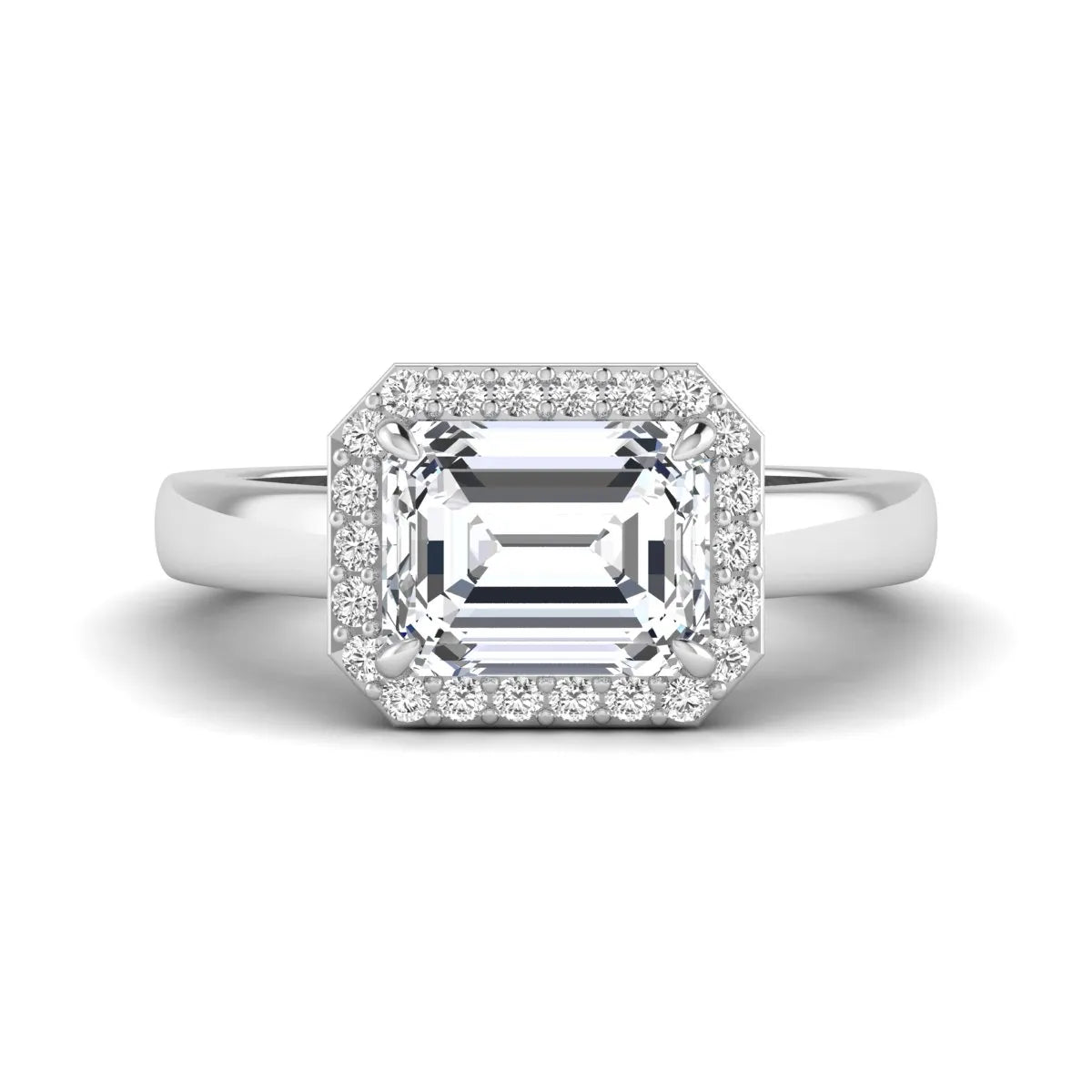 IGI certified emerald cut lab grown diamond halo engagement ring with round diamond halo in white gold.