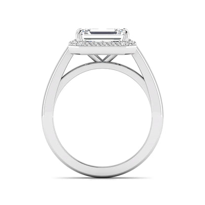 IGI certified emerald cut lab grown diamond halo engagement ring with round diamond halo in white gold.