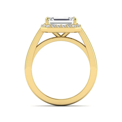 IGI certified emerald cut lab grown diamond halo engagement ring with round diamond halo in yellow gold.