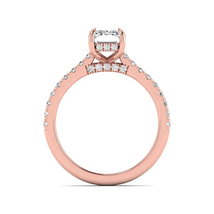 IGI certified emerald cut lab grown diamond hidden halo engagement ring with pavé round diamond band in rose gold.