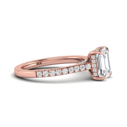 IGI certified emerald cut lab grown diamond hidden halo engagement ring with pavé round diamond band in rose gold.