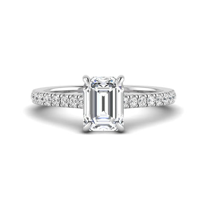 IGI certified emerald cut lab grown diamond hidden halo engagement ring with pavé round diamond band in white gold.