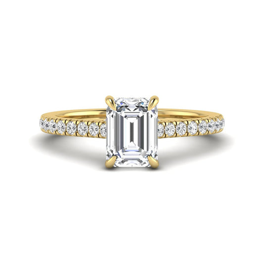 IGI certified emerald cut lab grown diamond hidden halo engagement ring with pavé round diamond band in yellow gold.