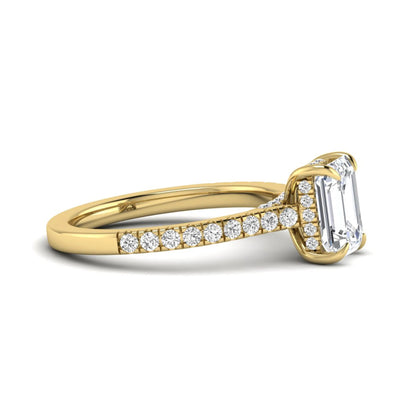 IGI certified emerald cut lab grown diamond hidden halo engagement ring with pavé round diamond band in yellow gold.