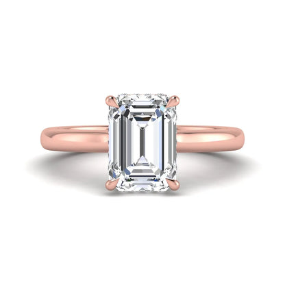 Emerald cut lab grown diamond hidden halo solitaire engagement ring in rose gold featuring a 3.01 carat IGI certified center diamond.