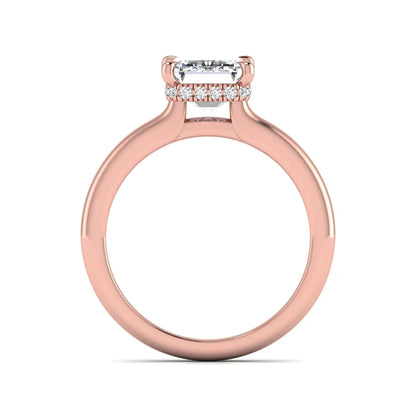 Emerald cut lab grown diamond hidden halo solitaire engagement ring in rose gold featuring a 3.01 carat IGI certified center diamond.