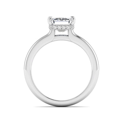 Emerald cut lab grown diamond hidden halo solitaire engagement ring in white gold featuring a 3.01 carat IGI certified center diamond.