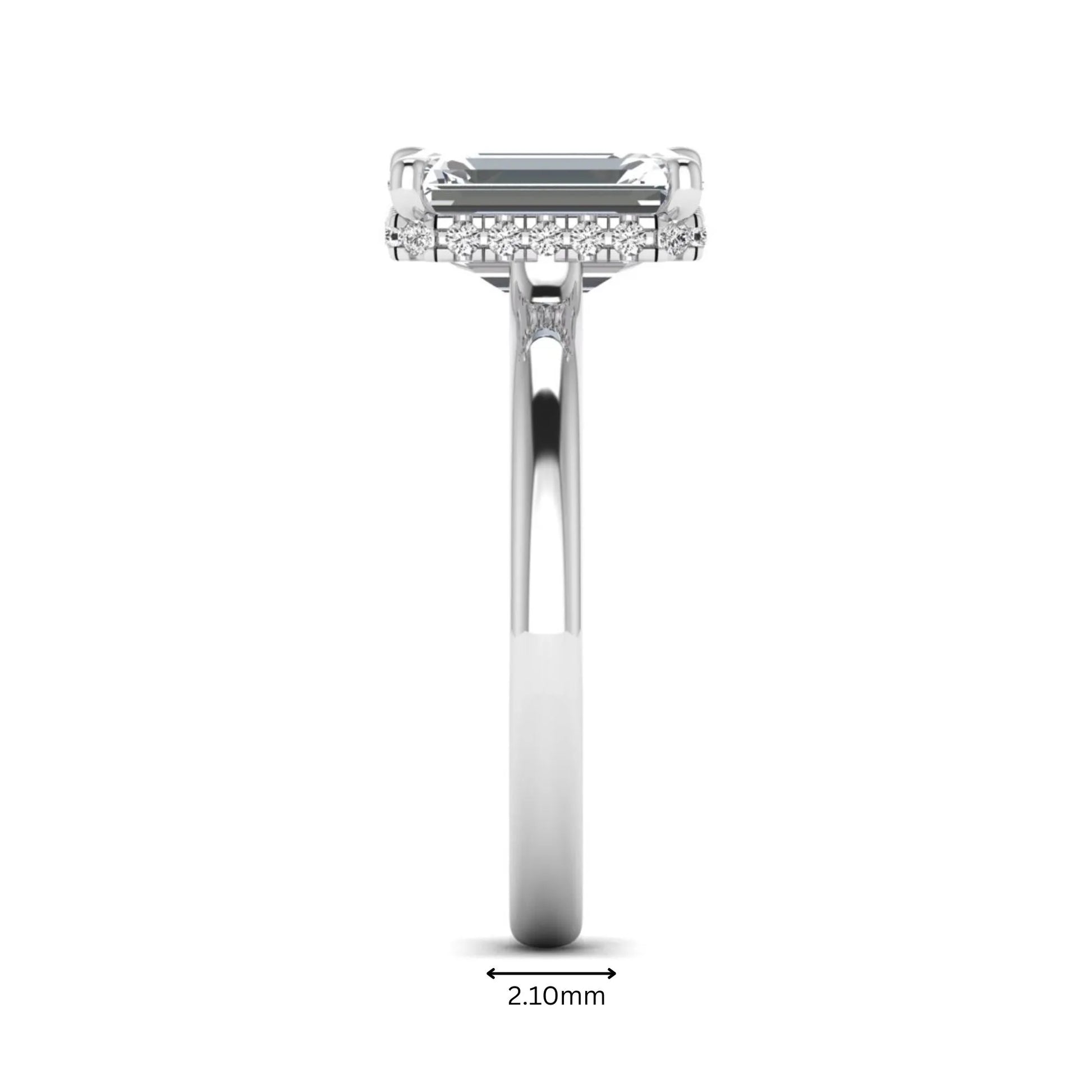 Emerald cut lab grown diamond hidden halo solitaire engagement ring in white gold featuring a 3.01 carat IGI certified center diamond.