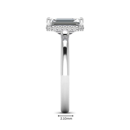 Emerald cut lab grown diamond hidden halo solitaire engagement ring in white gold featuring a 3.01 carat IGI certified center diamond.