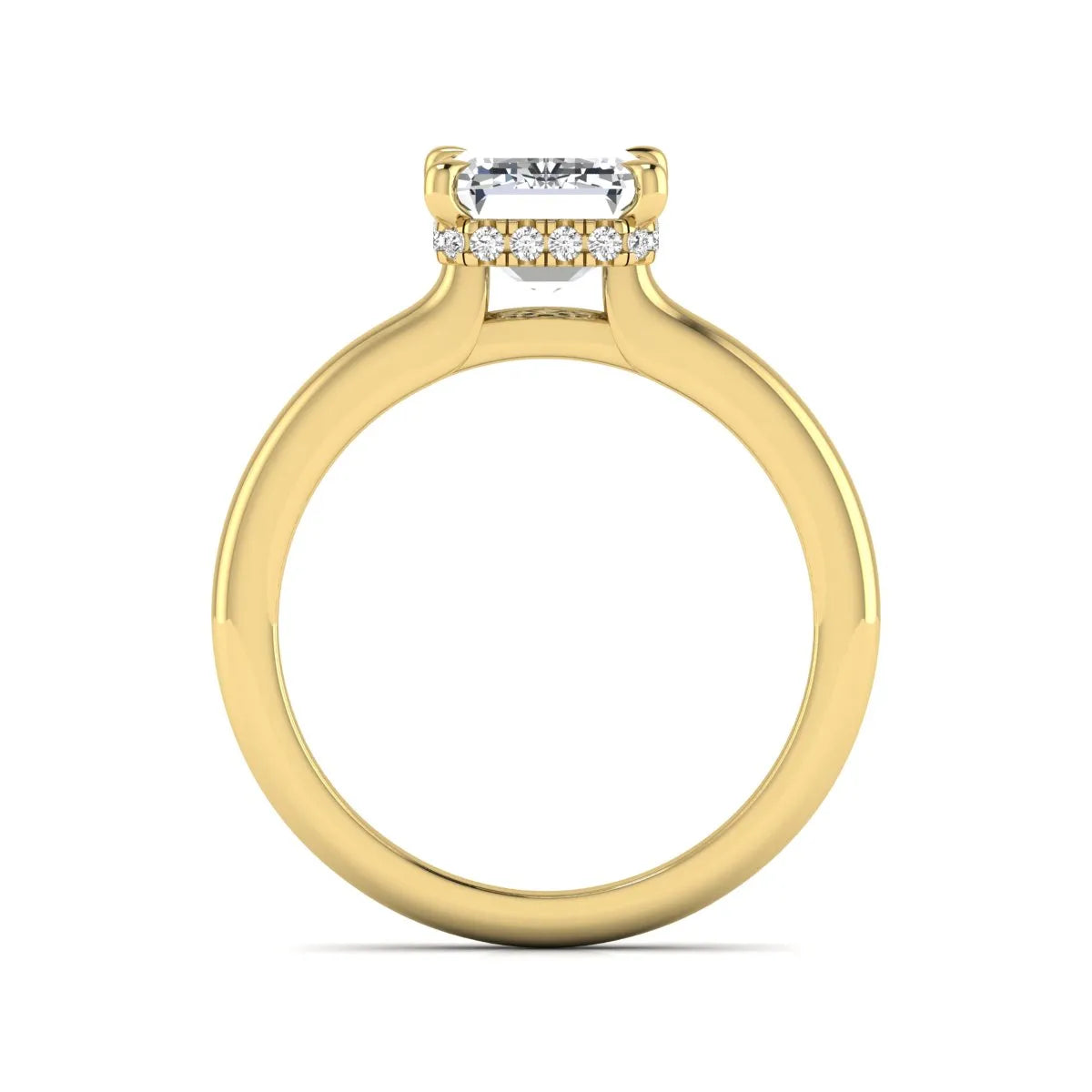 Emerald cut lab grown diamond hidden halo solitaire engagement ring in yellow gold featuring a 3.01 carat IGI certified center diamond.