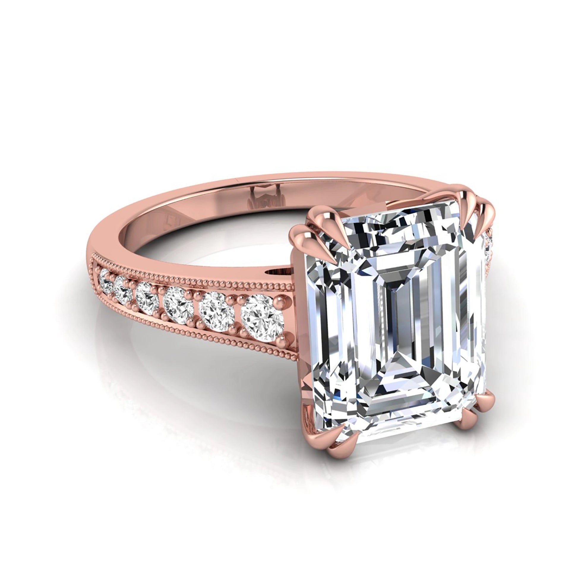 Emerald cut lab grown diamond engagement ring featuring a 3.79 carat IGI certified center diamond with round side diamonds and vintage milgrain detailing in rose gold.