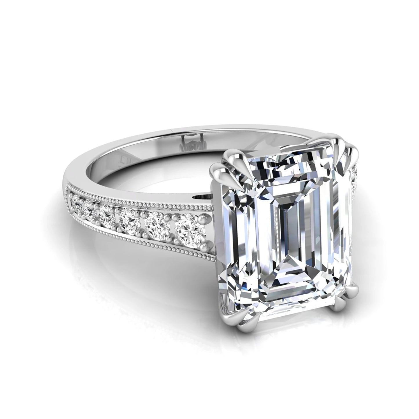 Emerald cut lab grown diamond engagement ring featuring a 3.79 carat IGI certified center diamond with round side diamonds and vintage milgrain detailing in white gold.