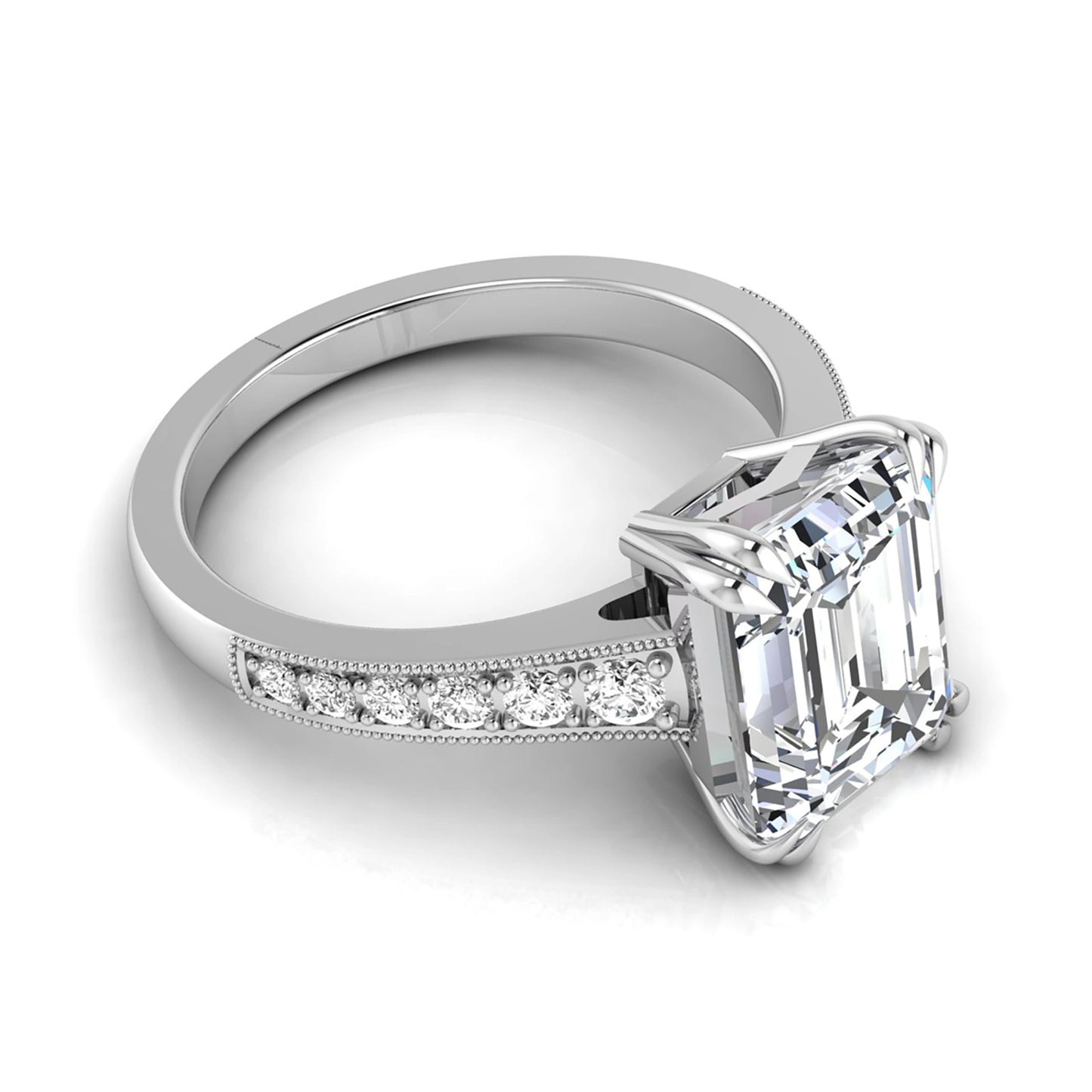 Emerald cut lab grown diamond engagement ring featuring a 3.79 carat IGI certified center diamond with round side diamonds and vintage milgrain detailing in white gold.