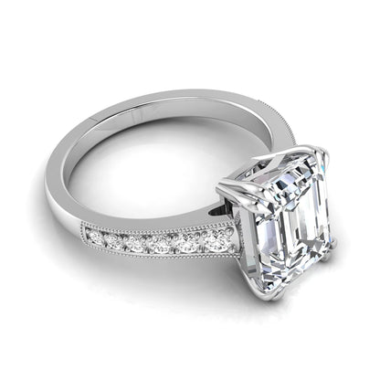 Emerald cut lab grown diamond engagement ring featuring a 3.79 carat IGI certified center diamond with round side diamonds and vintage milgrain detailing in white gold.