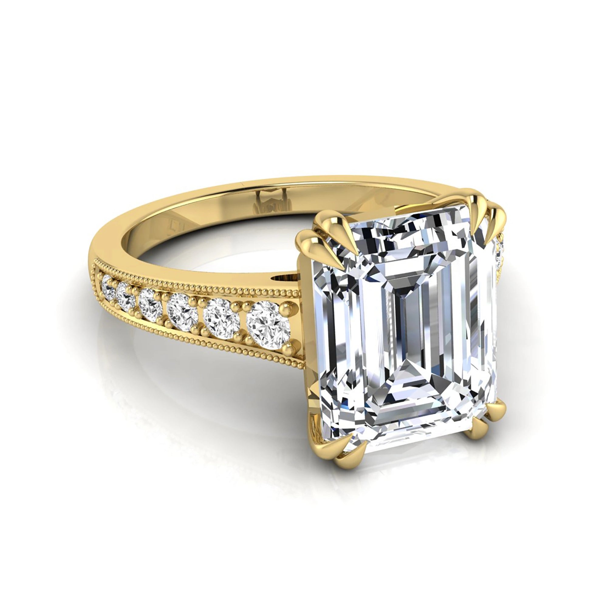 Emerald cut lab grown diamond engagement ring featuring a 3.79 carat IGI certified center diamond with round side diamonds and vintage milgrain detailing in yellow gold.