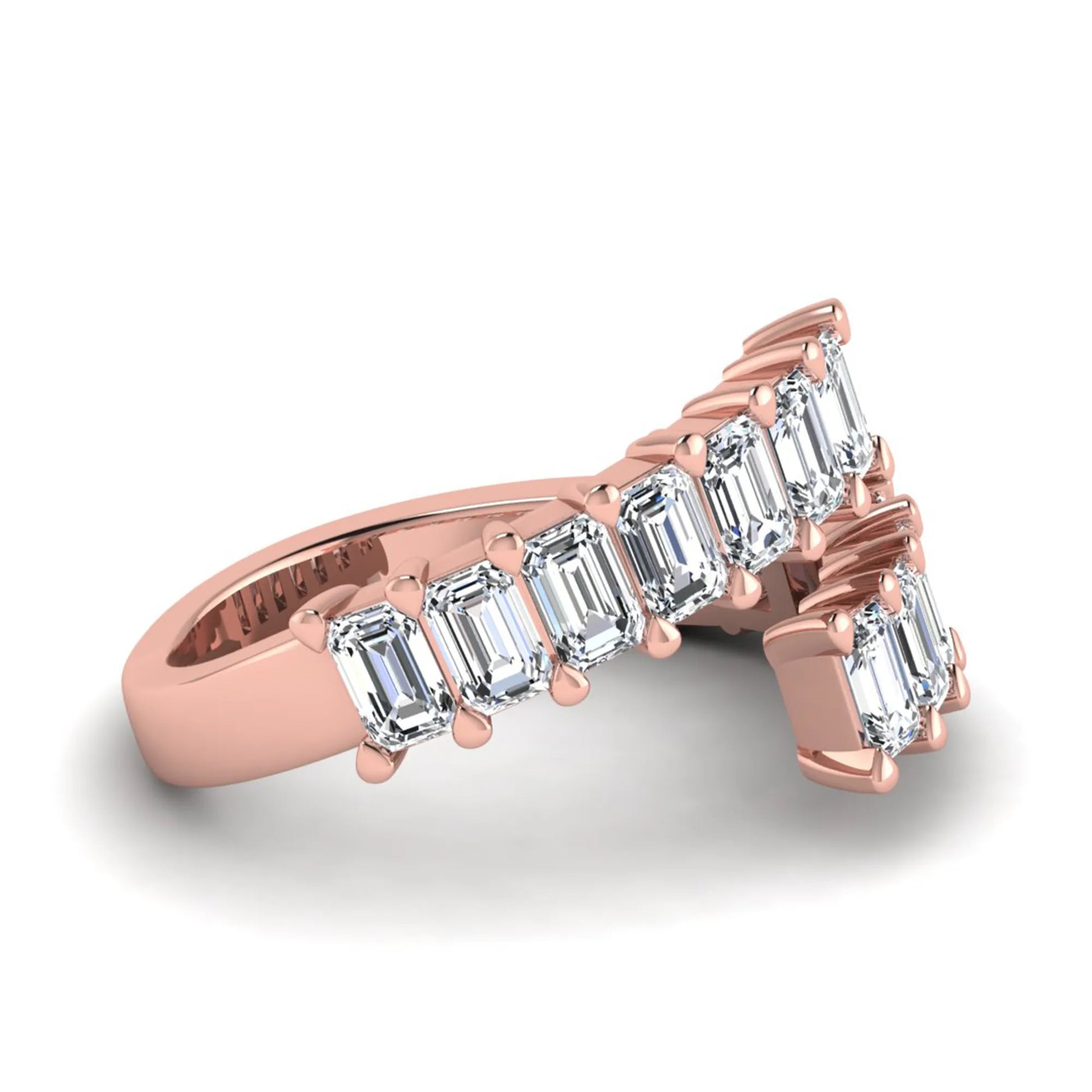 Emerald cut lab grown diamond open cuff bypass ring with prong setting in rose gold tone.