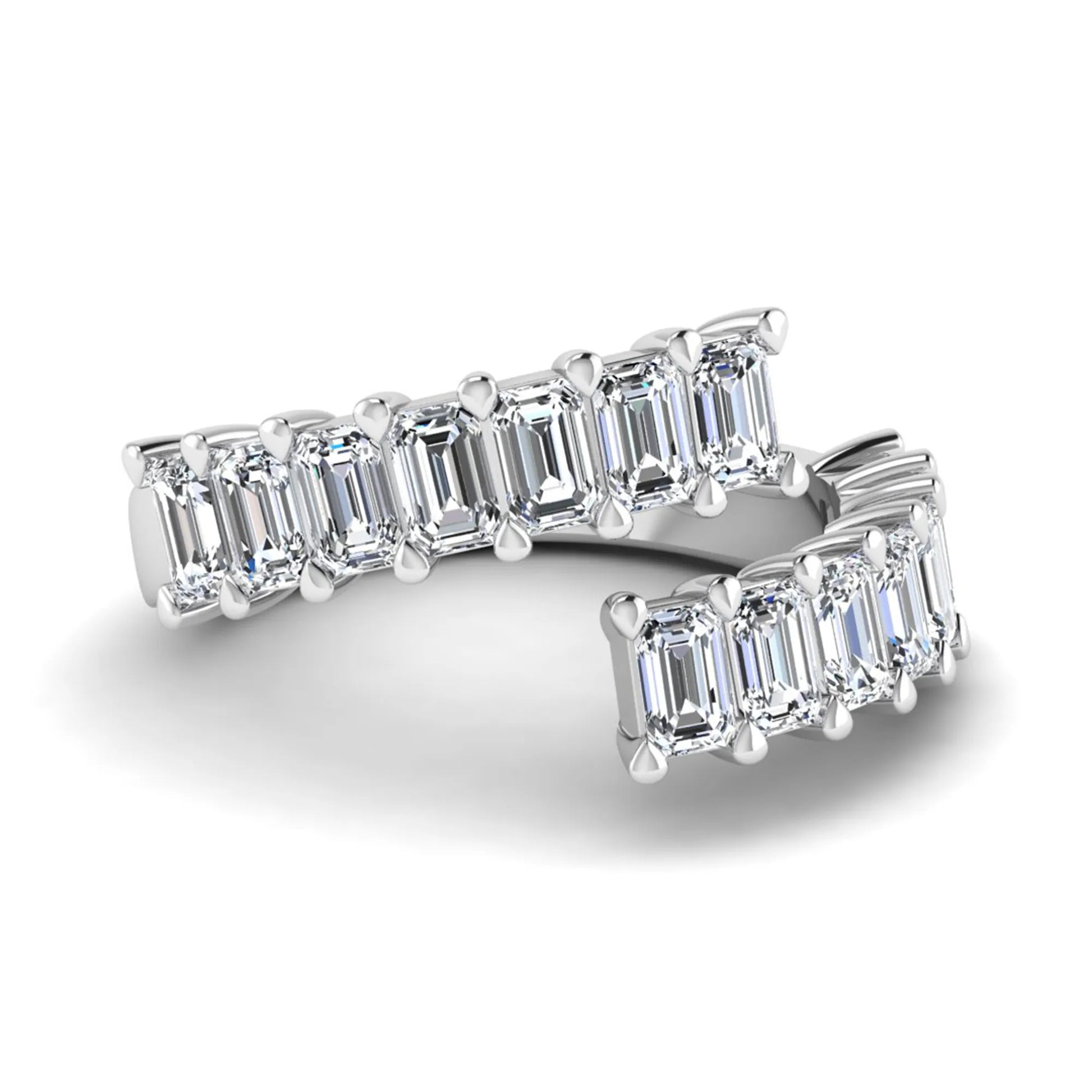 Emerald cut lab grown diamond open cuff bypass ring with prong setting in white gold tone.