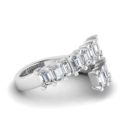 Emerald cut lab grown diamond open cuff bypass ring with prong setting in white gold tone.