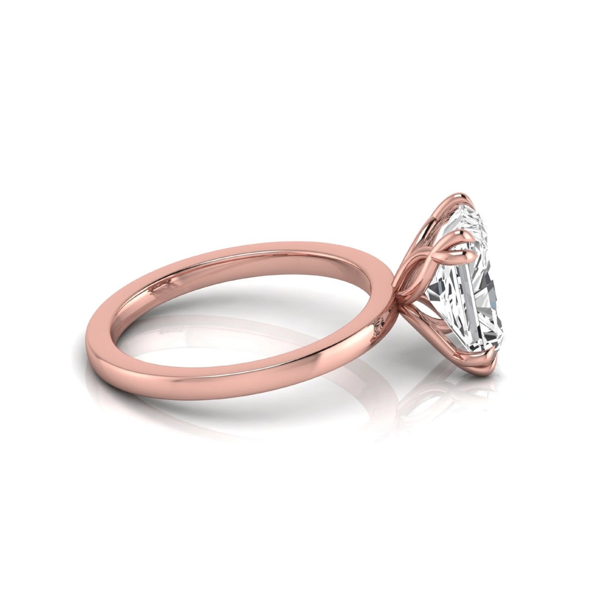 Emerald cut lab grown diamond solitaire engagement ring featuring an approximately 2.62 carat IGI certified emerald cut diamond in a classic four-prong rose gold setting.