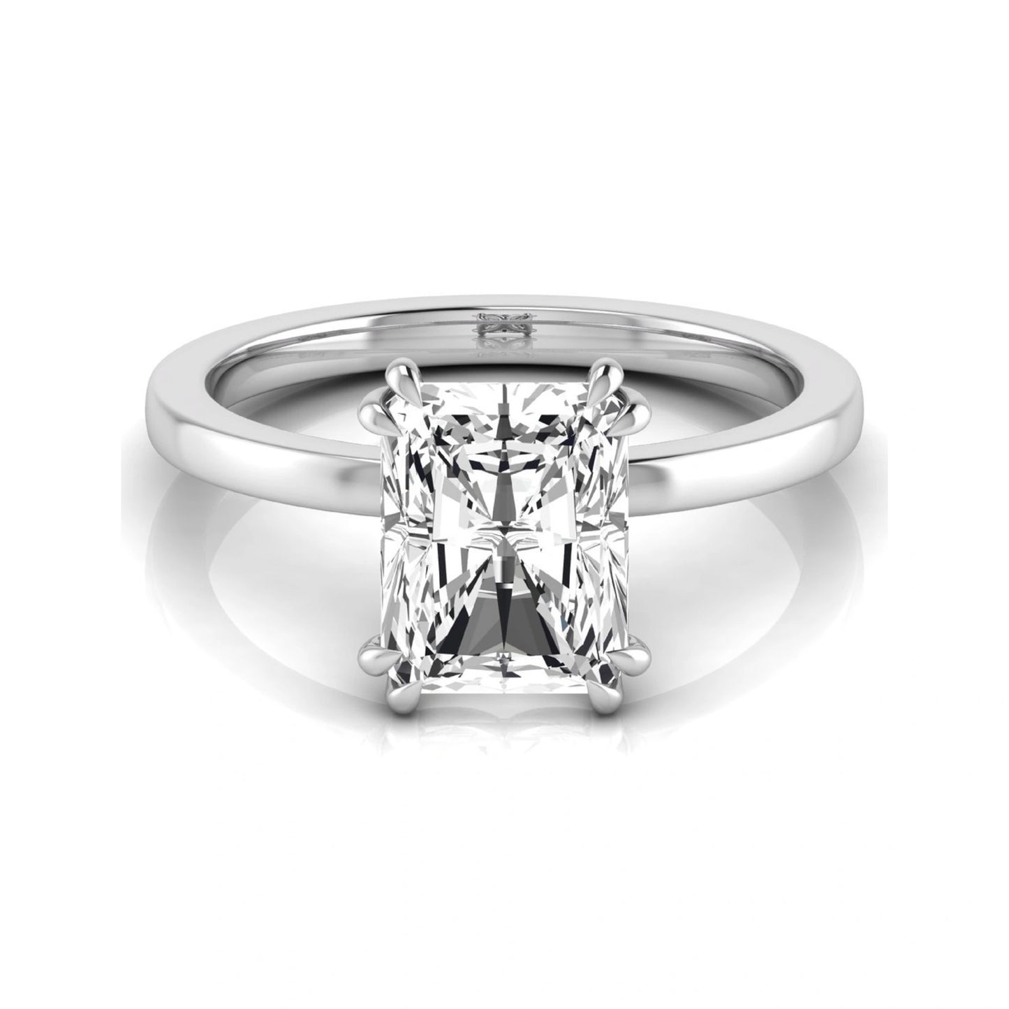 Emerald cut lab grown diamond solitaire engagement ring featuring an approximately 2.62 carat IGI certified emerald cut diamond in a classic four-prong white gold setting.