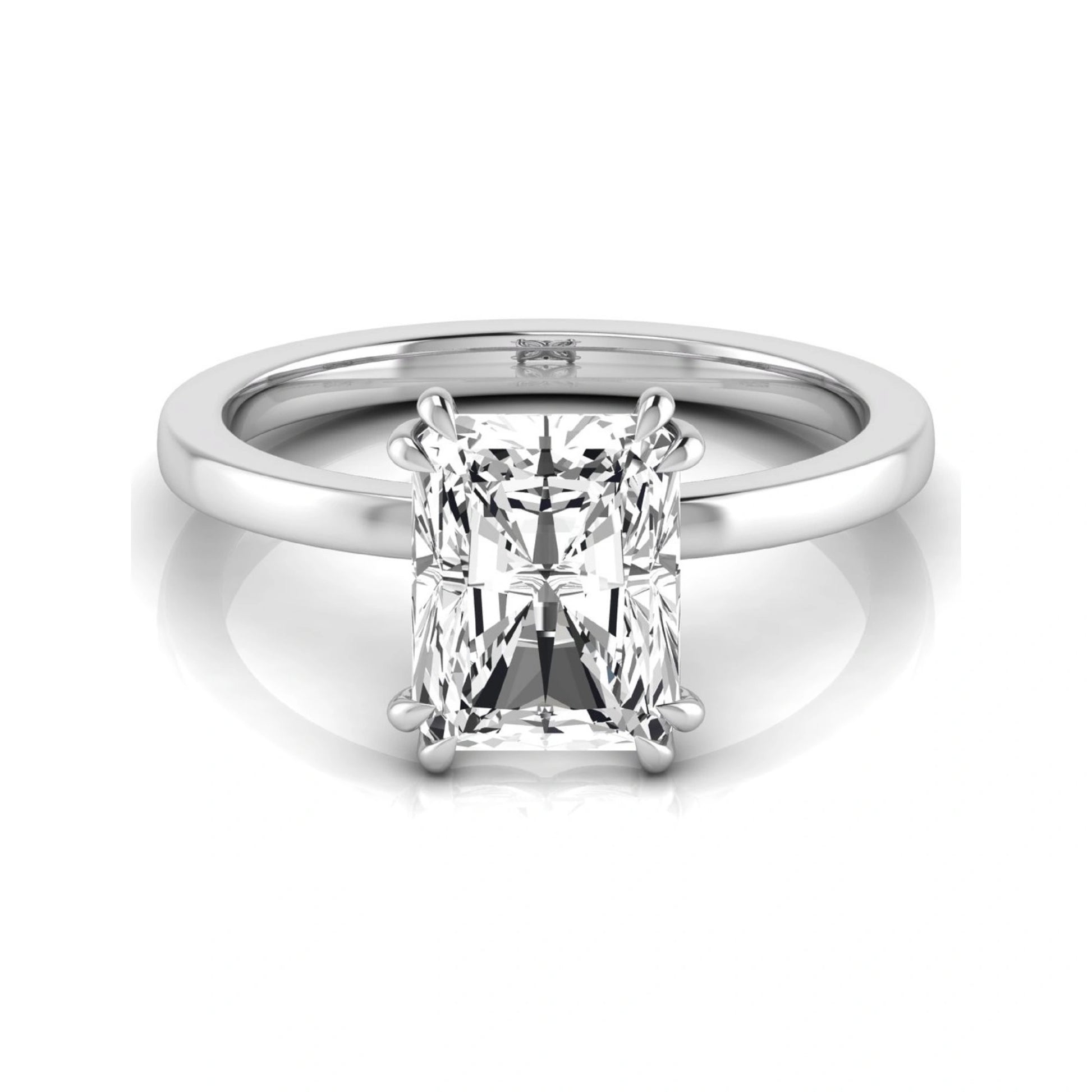 Emerald cut lab grown diamond solitaire engagement ring featuring an approximately 2.62 carat IGI certified emerald cut diamond in a classic four-prong white gold setting.