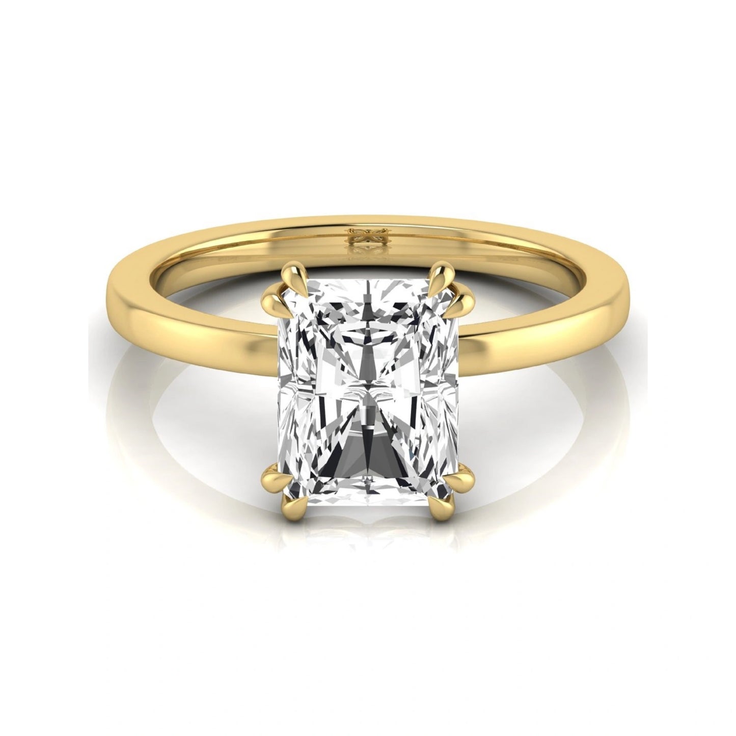 Emerald cut lab grown diamond solitaire engagement ring featuring an approximately 2.62 carat IGI certified emerald cut diamond in a classic four-prong yellow gold setting.
