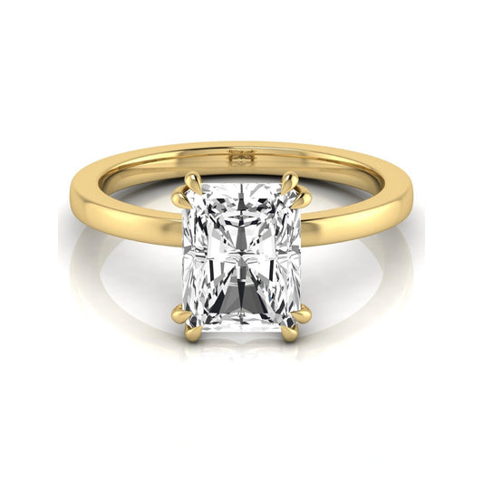Emerald cut lab grown diamond solitaire engagement ring featuring an approximately 2.62 carat IGI certified emerald cut diamond in a classic four-prong yellow gold setting.
