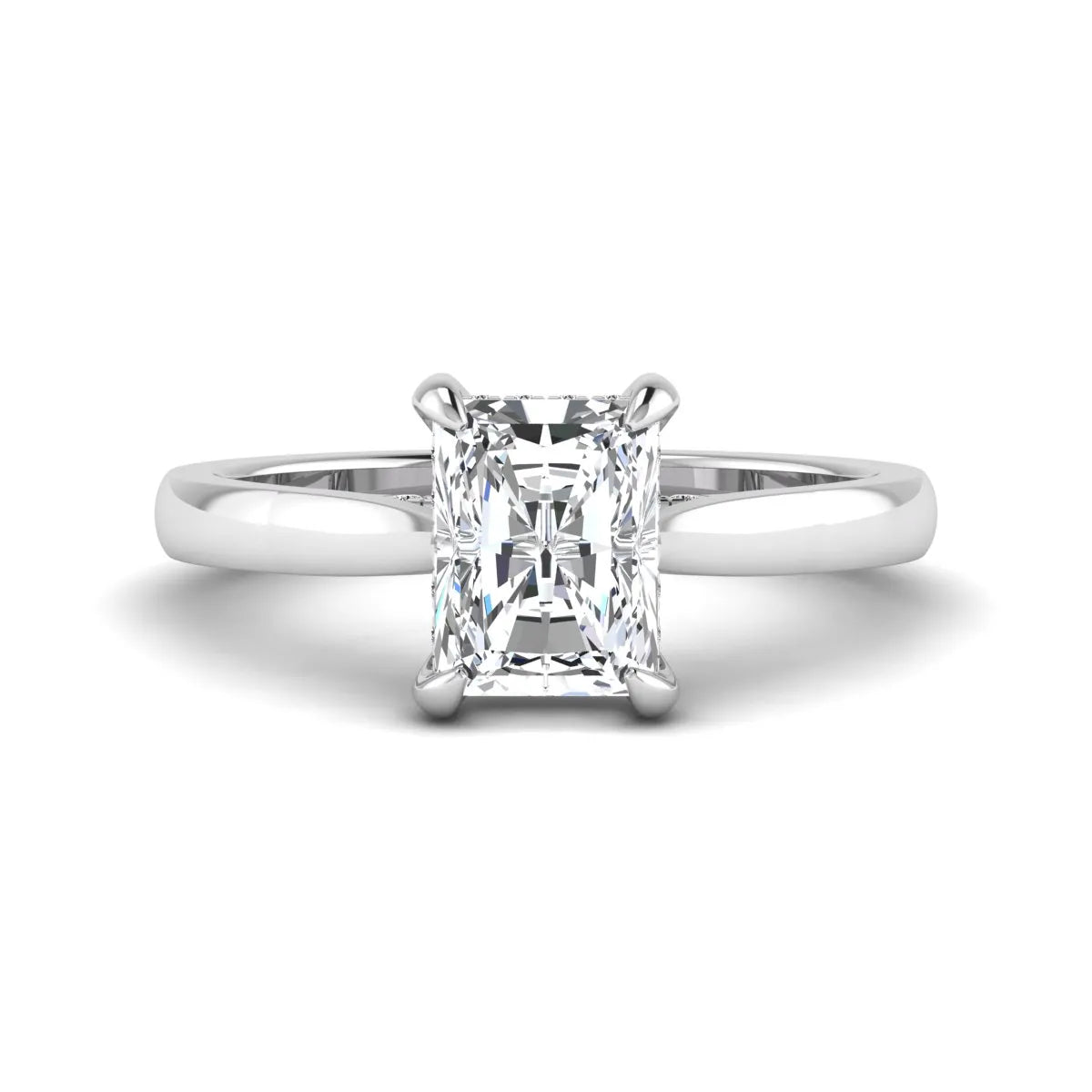 Emerald cut lab grown diamond solitaire engagement ring featuring a 1.74 carat IGI certified center diamond with hidden pavé accents in white gold.