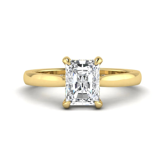Emerald cut lab grown diamond solitaire engagement ring featuring a 1.74 carat IGI certified center diamond with hidden pavé accents in yellow gold.