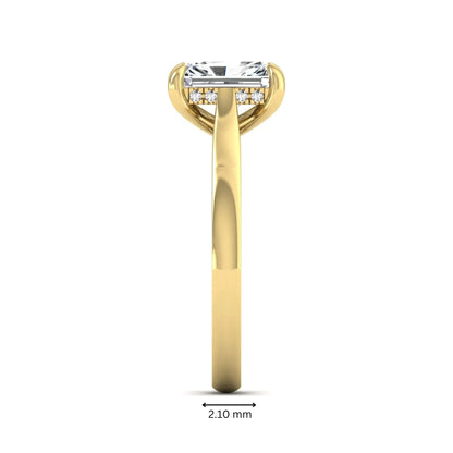 Emerald cut lab grown diamond solitaire engagement ring featuring a 1.74 carat IGI certified center diamond with hidden pavé accents in yellow gold.