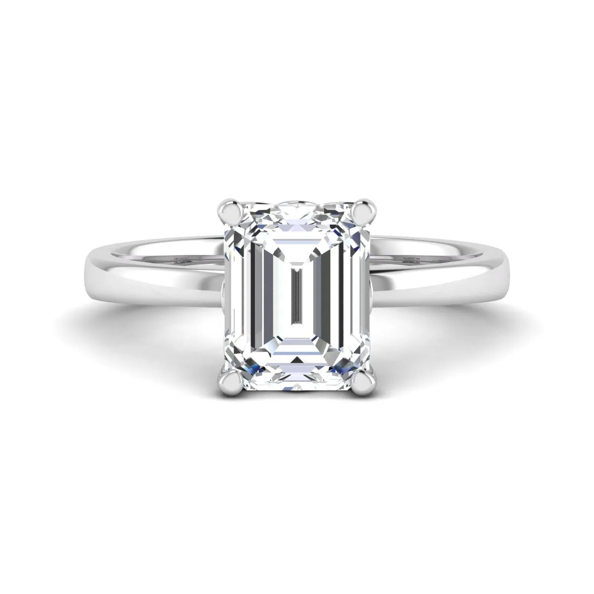 Emerald cut lab grown diamond solitaire engagement ring featuring a 2.62 carat IGI certified center diamond in white gold.