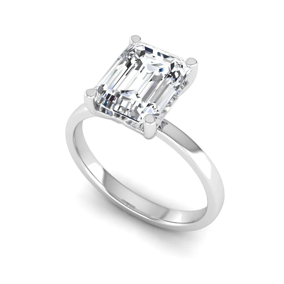 Emerald cut lab grown diamond solitaire engagement ring featuring a 2.62 carat IGI certified center diamond in white gold.