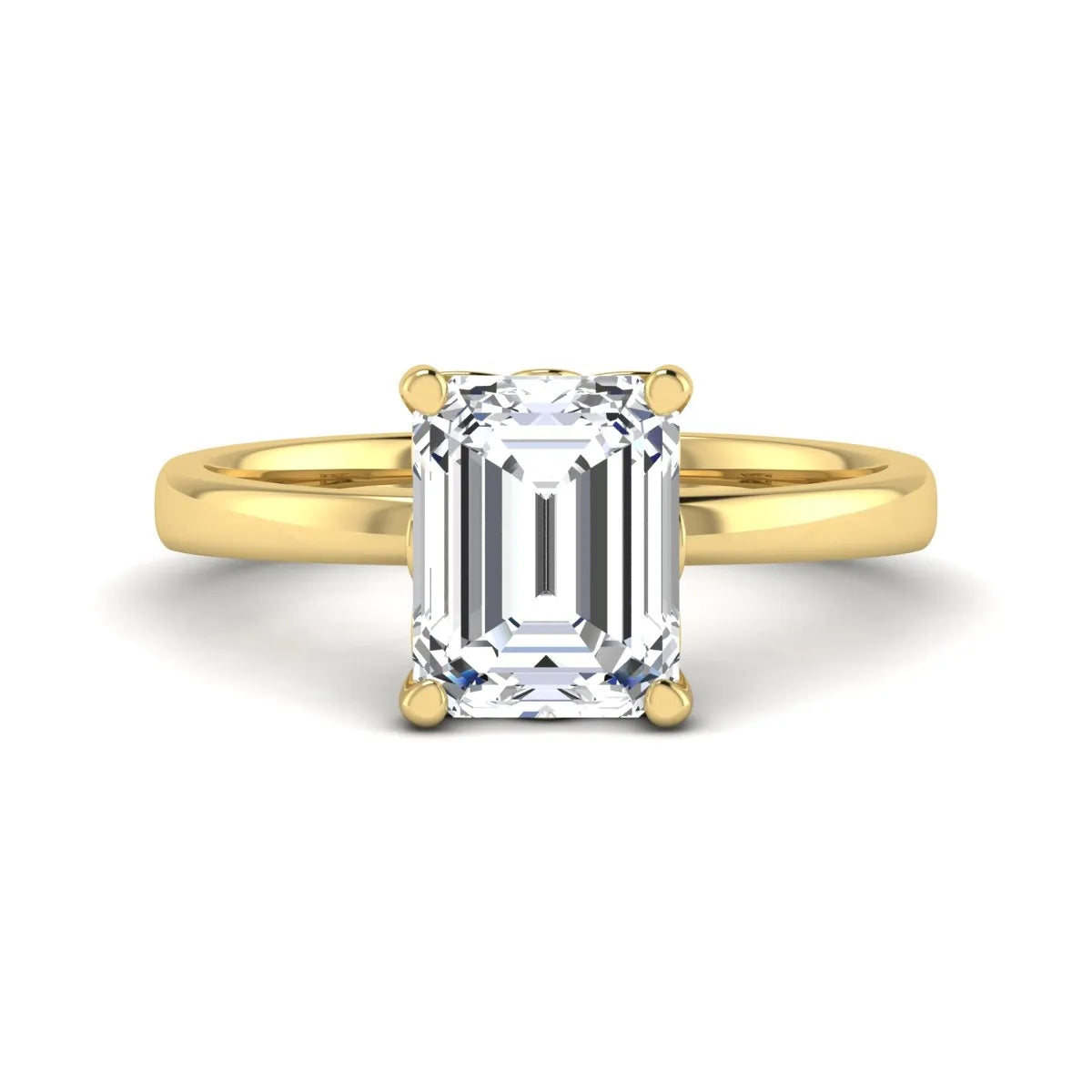 Emerald cut lab grown diamond solitaire engagement ring featuring a 2.62 carat IGI certified center diamond in yellow gold.