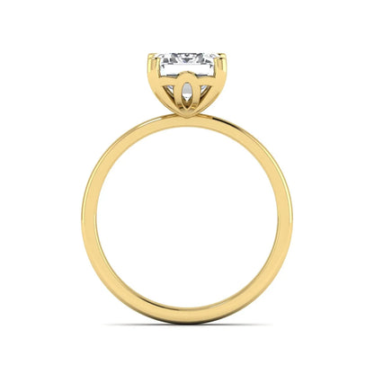 Emerald cut lab grown diamond solitaire engagement ring featuring a 2.62 carat IGI certified center diamond in yellow gold.