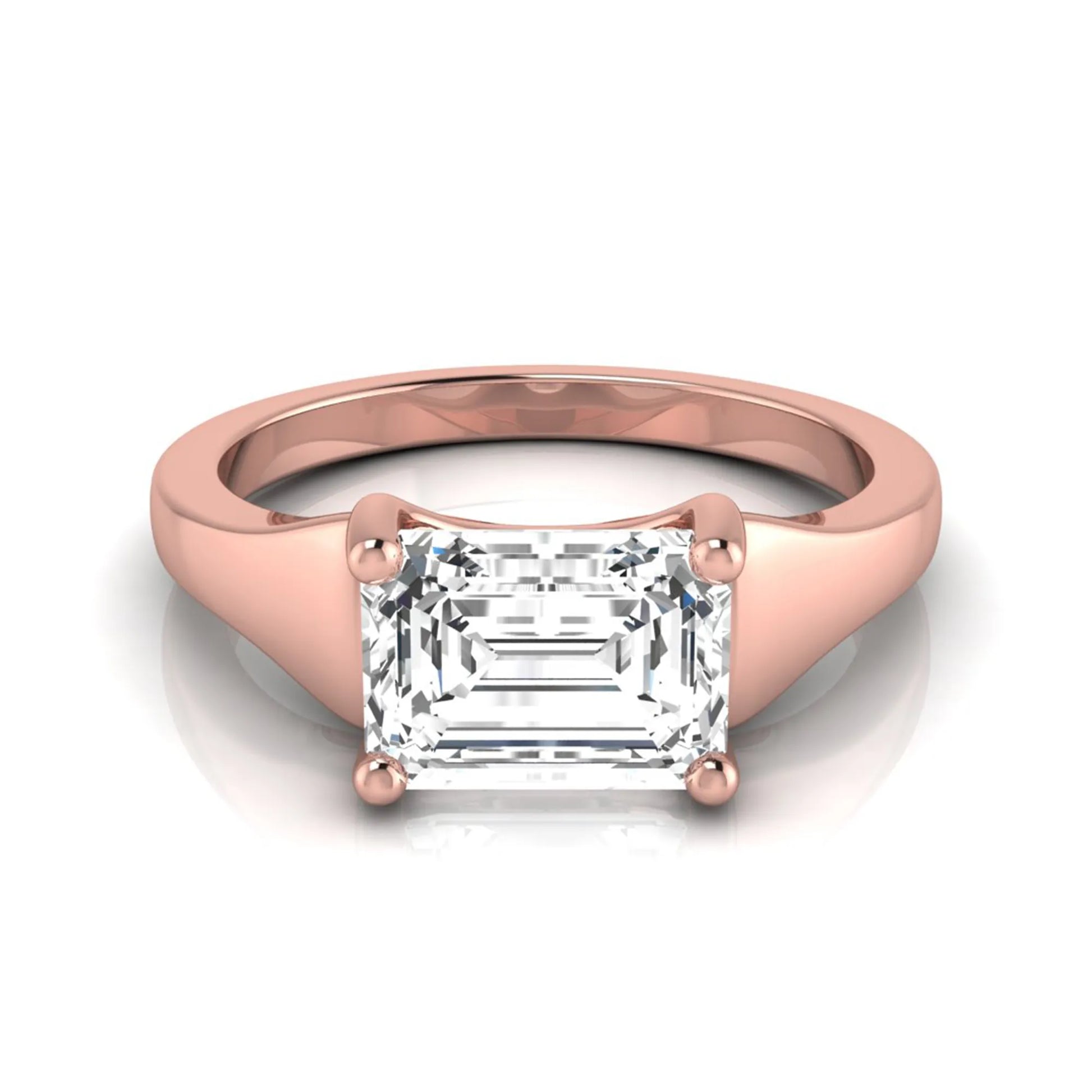 Emerald cut lab grown diamond solitaire engagement ring featuring a 1.74 carat IGI certified emerald diamond in a classic four-prong rose gold setting.