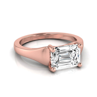 Emerald cut lab grown diamond solitaire engagement ring featuring a 1.74 carat IGI certified emerald diamond in a classic four-prong rose gold setting.