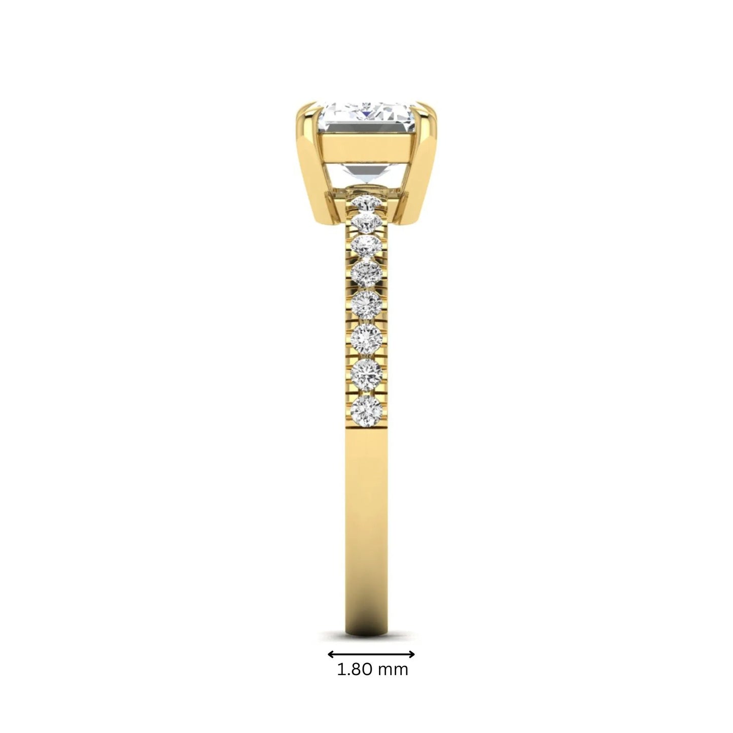 Emerald cut lab grown diamond solitaire pavé engagement ring with four-prong setting and yellow gold tone band.