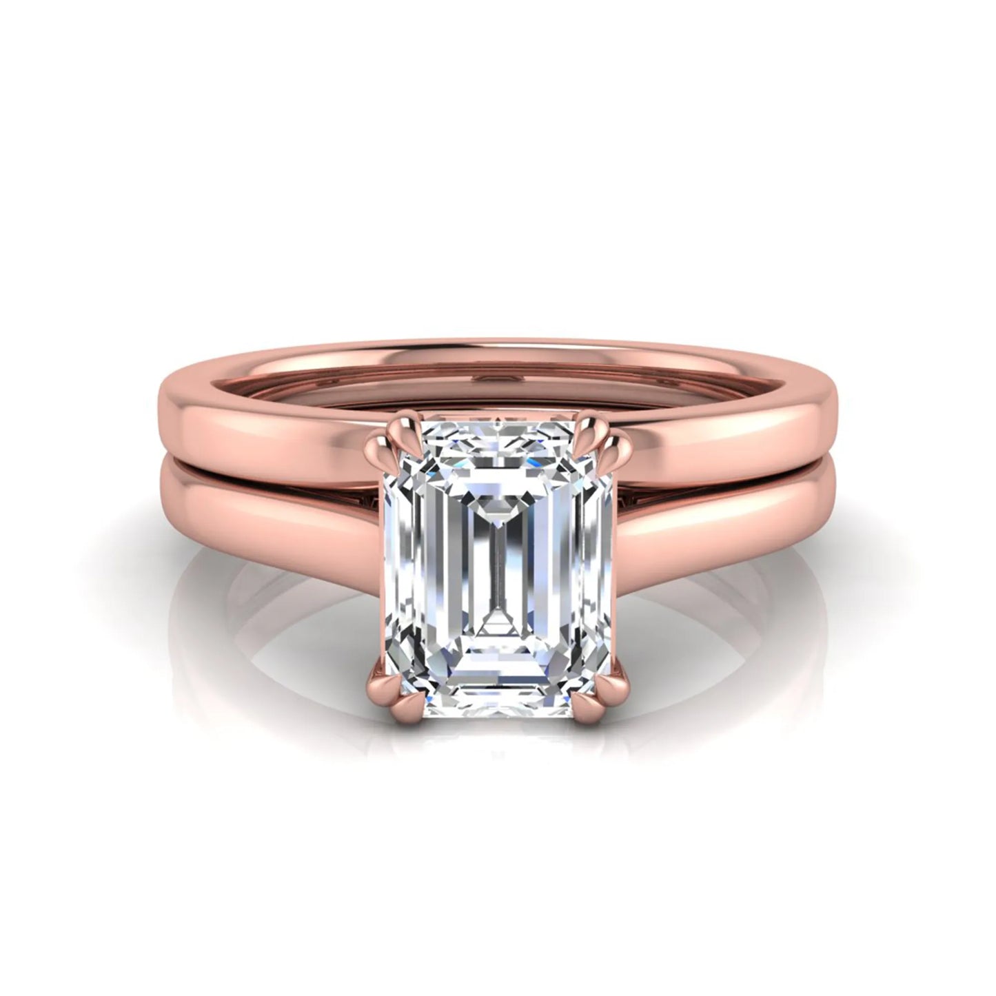Emerald cut lab grown diamond solitaire ring set featuring a 1.74 carat IGI certified center diamond in a four-prong setting with a matching plain wedding band in a rose gold design.