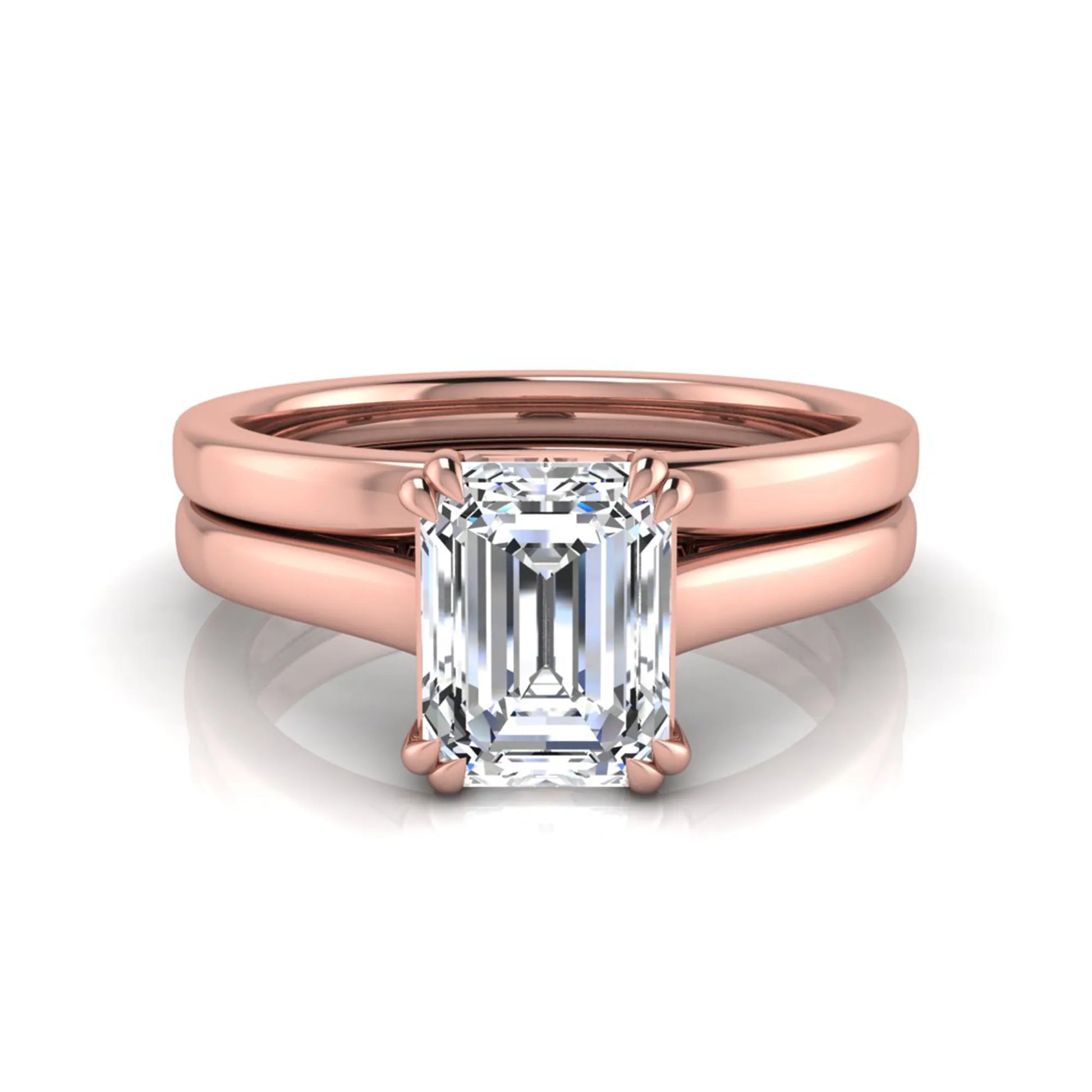 Emerald cut lab grown diamond solitaire ring set featuring a 1.74 carat IGI certified center diamond in a four-prong setting with a matching plain wedding band in a rose gold design.