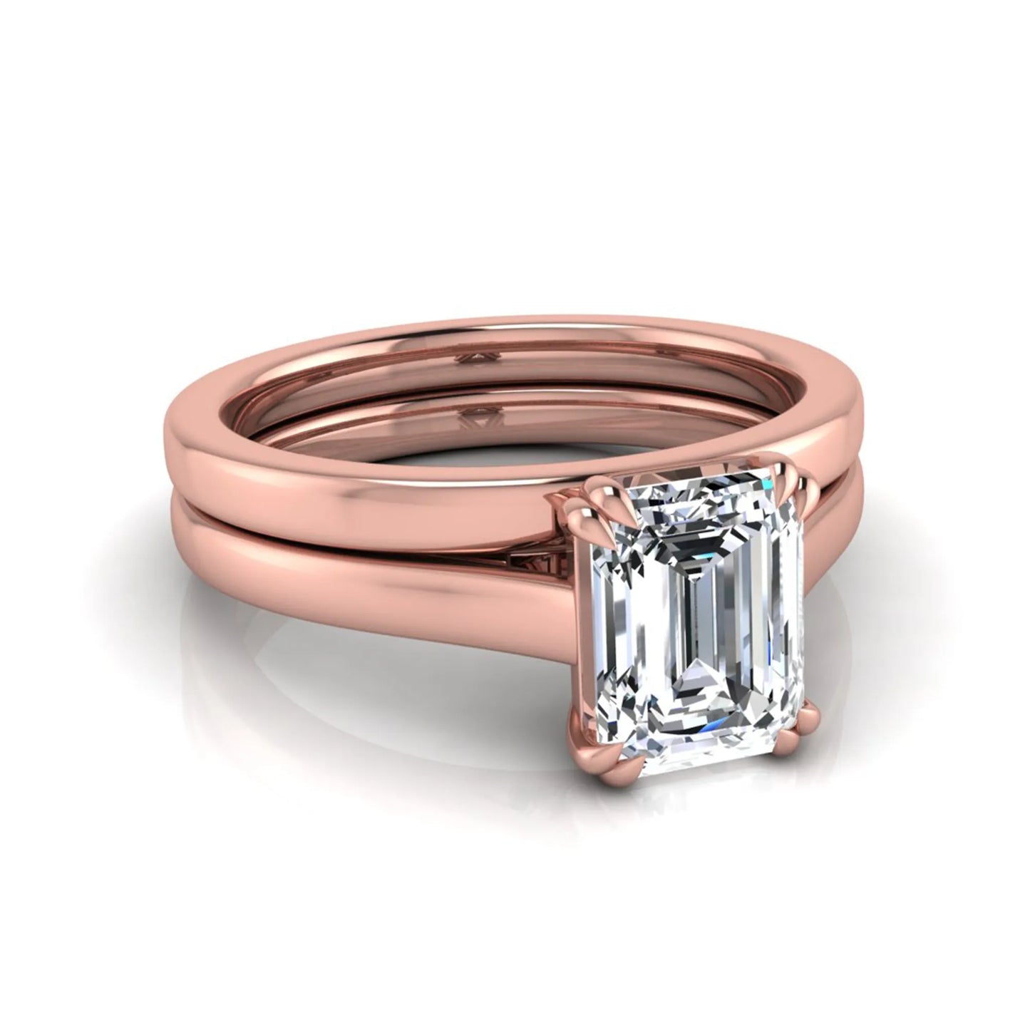 Emerald cut lab grown diamond solitaire ring set featuring a 1.74 carat IGI certified center diamond in a four-prong setting with a matching plain wedding band in a rose gold design.