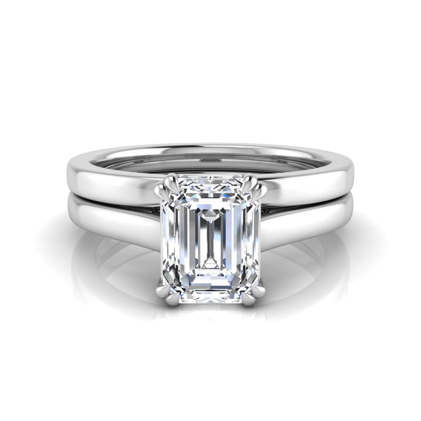 Emerald cut lab grown diamond solitaire ring set featuring a 1.74 carat IGI certified center diamond in a four-prong setting with a matching plain wedding band in a white gold design.