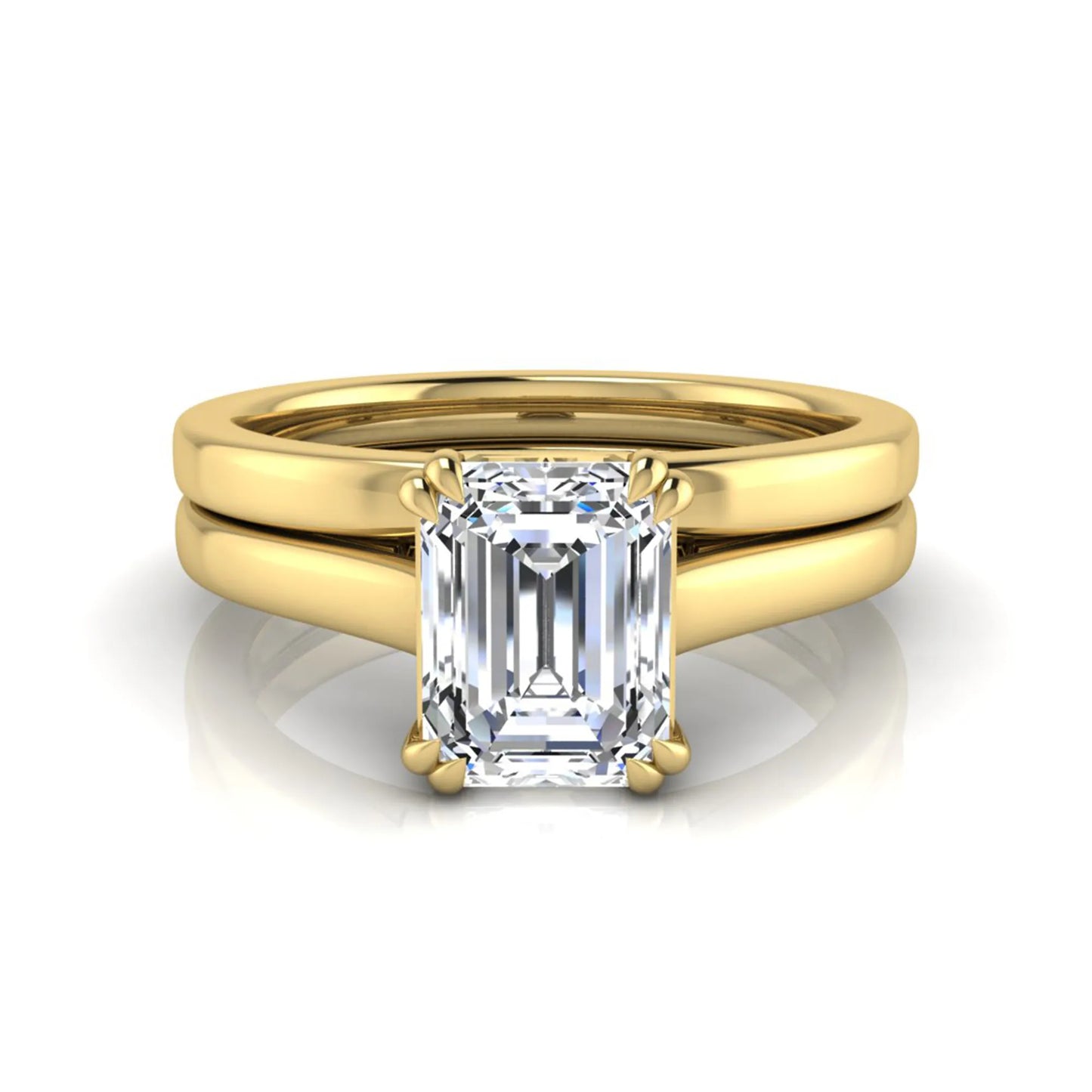 Emerald cut lab grown diamond solitaire ring set featuring a 1.74 carat IGI certified center diamond in a four-prong setting with a matching plain wedding band in a yellow gold design.