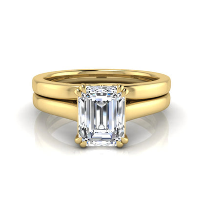 Emerald cut lab grown diamond solitaire ring set featuring a 1.74 carat IGI certified center diamond in a four-prong setting with a matching plain wedding band in a yellow gold design.