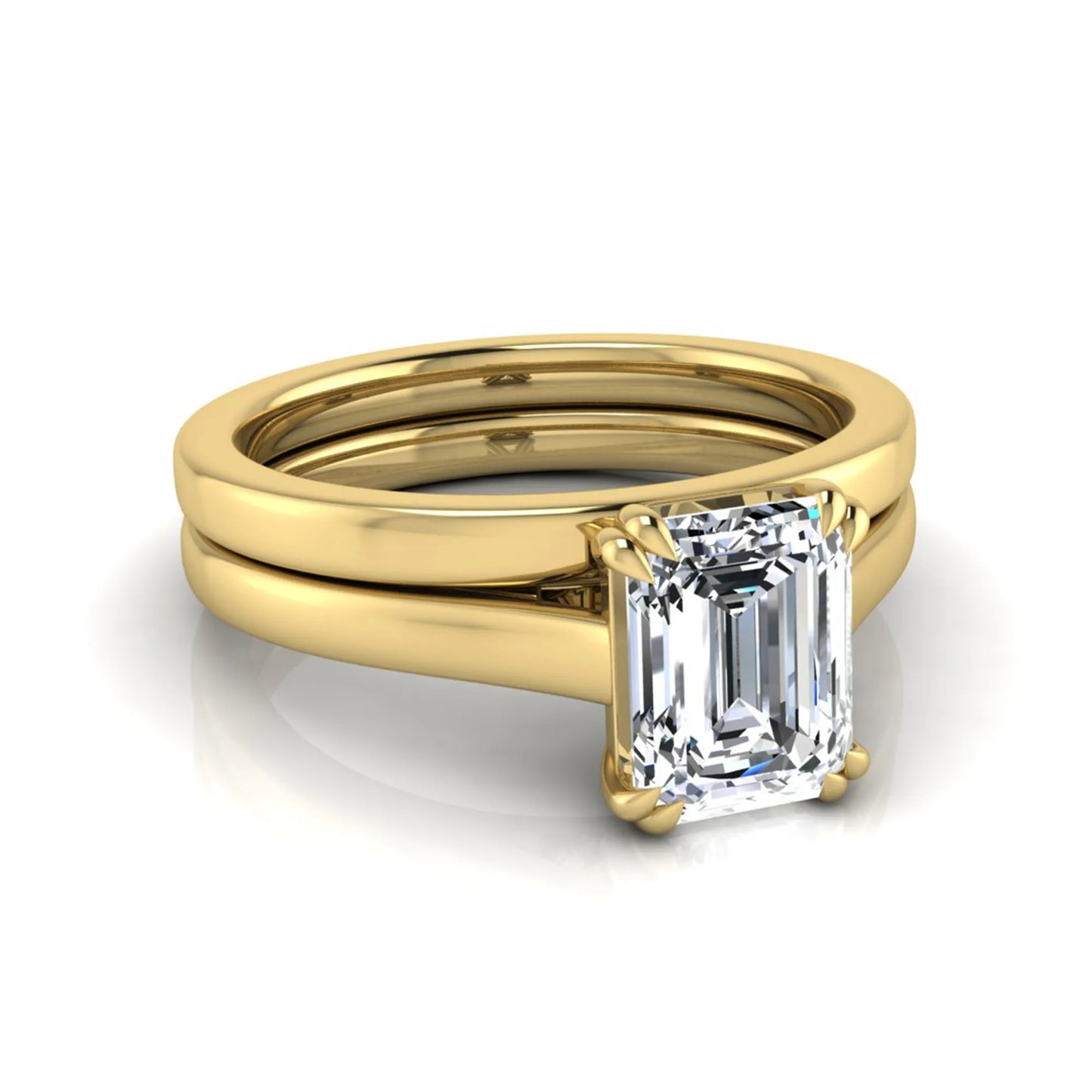 Emerald cut lab grown diamond solitaire ring set featuring a 1.74 carat IGI certified center diamond in a four-prong setting with a matching plain wedding band in a yellow gold design.
