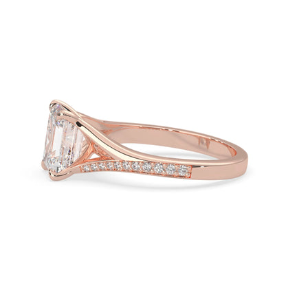 Rose gold ring with a diamond on a white background