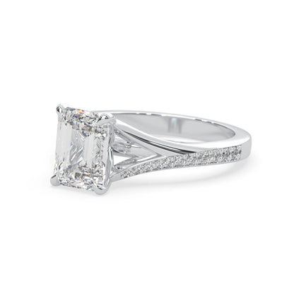 white gold Diamond ring with a princess-cut center stone on a white background