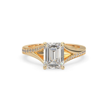 yellow Gold ring with a large diamond on a white background